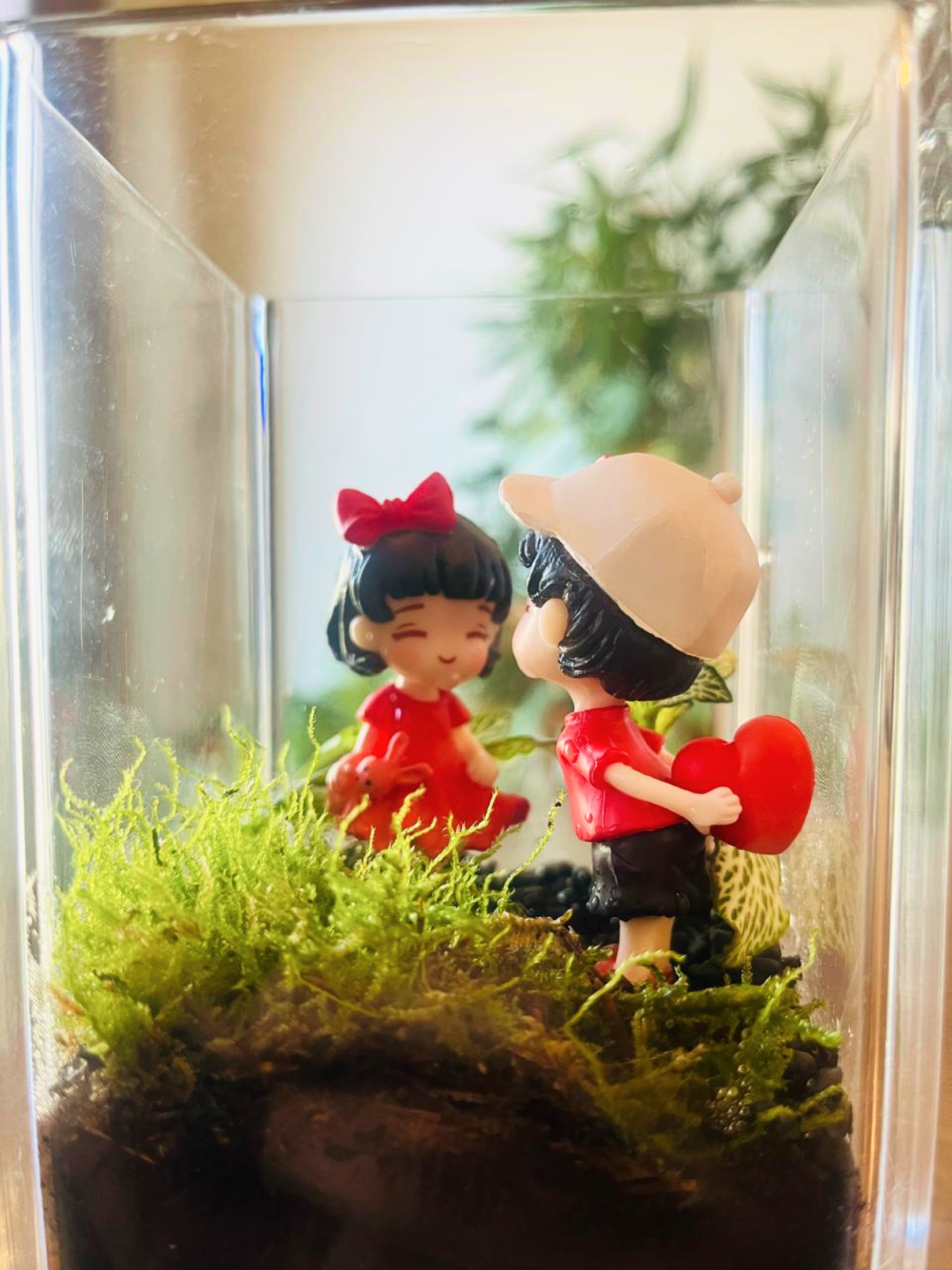 8x8 cm glass terrarium with natural moss, pebbles, and love couple miniature — Dubai gifting
