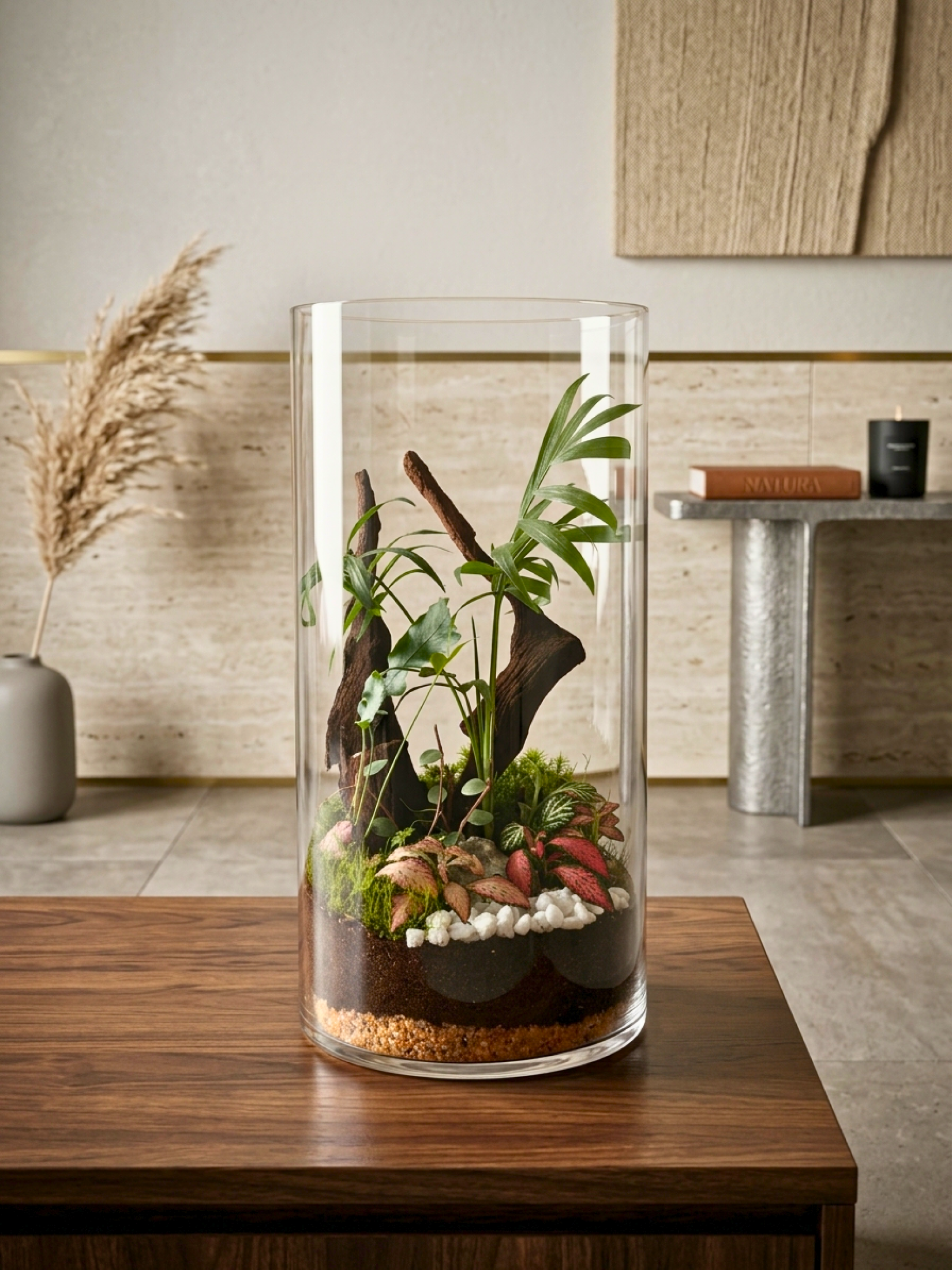 Emerald Canopy Classic Plus Cylinder Terrarium by Lilli Plants Dubai with Parlor Palm, moss, and driftwood.