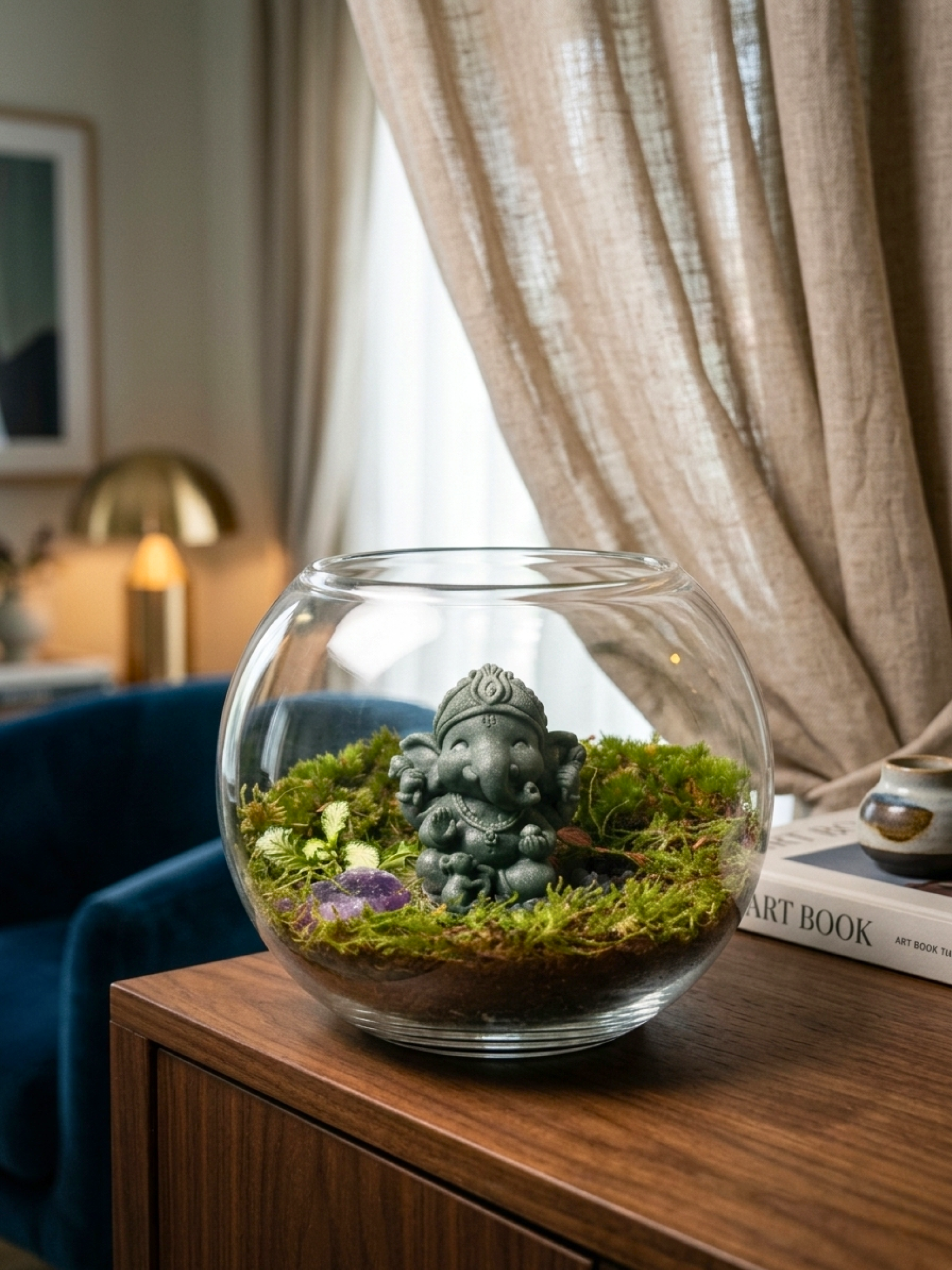 Ganesha terrarium Dubai by Lilli Plants with lush moss and spiritual indoor décor design.
