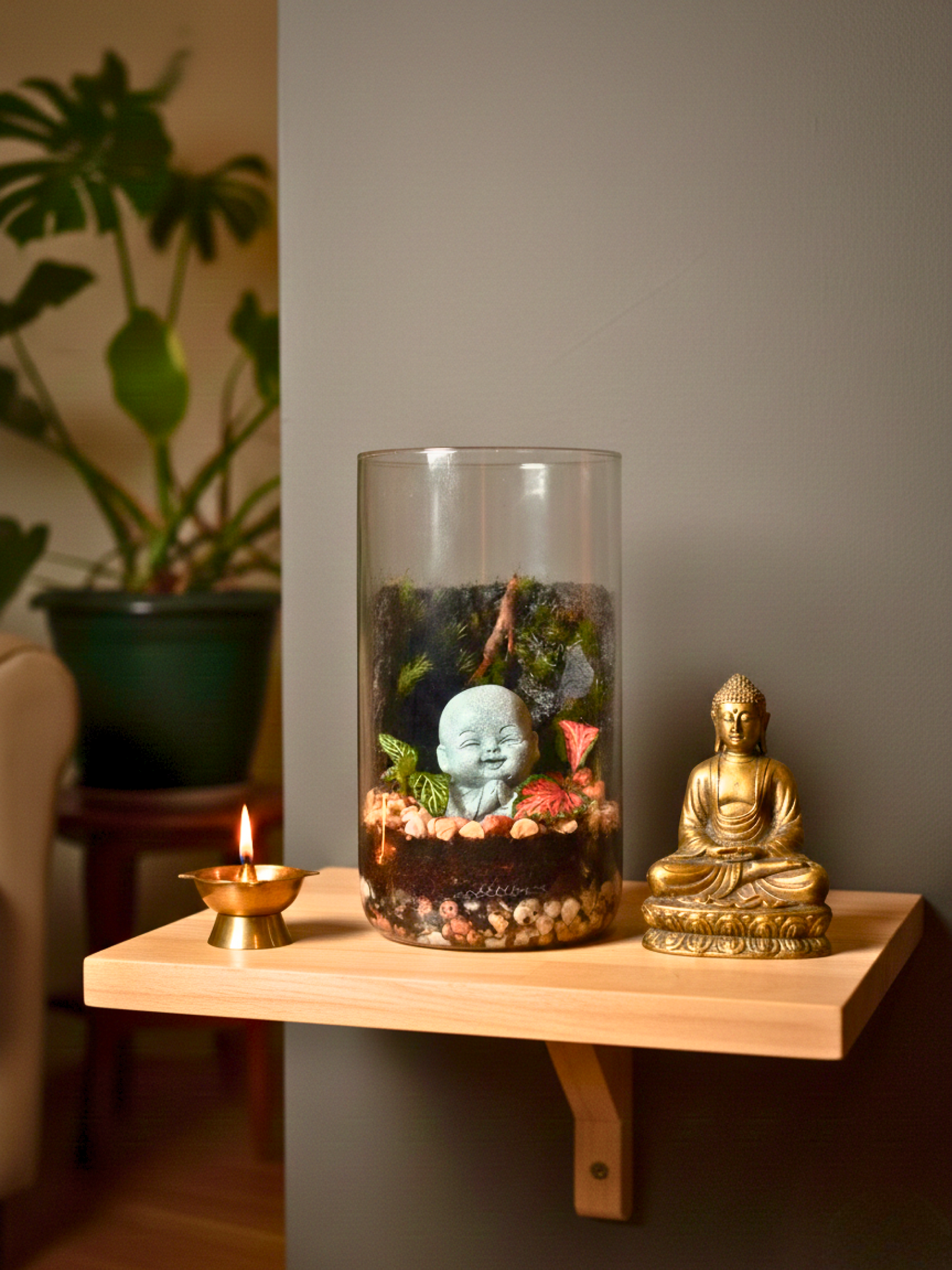 Baby Laughing Buddha Petite Terrarium in glass cylinder by Lilli Plants Dubai