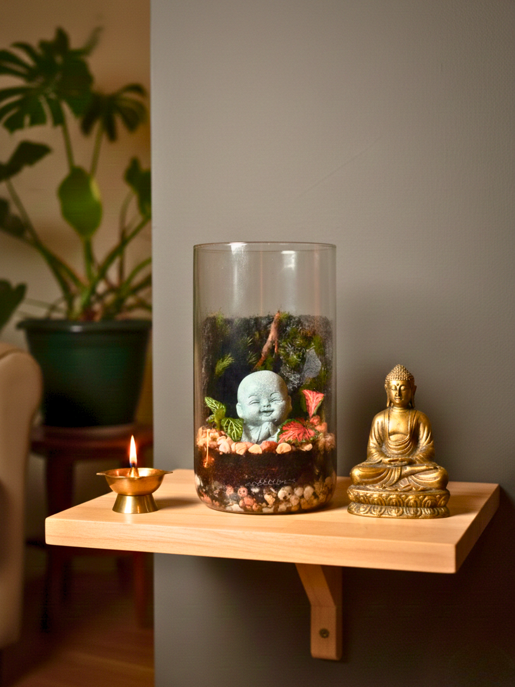 Baby Laughing Buddha Petite Terrarium in glass cylinder by Lilli Plants Dubai