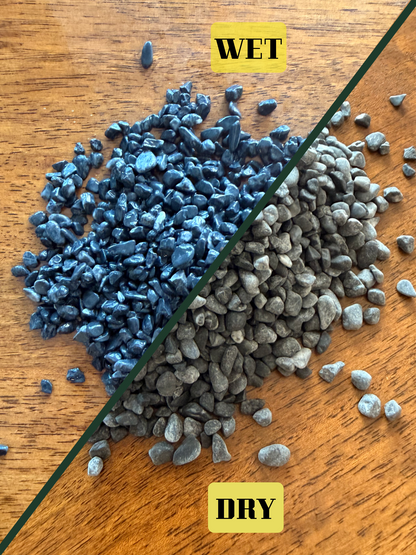 Decorative drainage pebbles in charcoal black, ideal for terrariums, aquascaping, and indoor plant arrangements