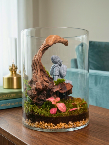 Meditative Arc Buddha terrarium with driftwood and moss in classic cylinder glass by Lilli Plants Dubai